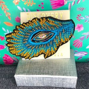 Beaded peacock feather broach